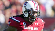 Nov 2, 2013; Columbia, SC, USA; South Carolina Gamecocks defensive end Jadeveon Clowney (7) stands on the sidelines during a timeout against the Mississippi State Bulldogs at Williams-Brice Stadium. The Gamecocks defeated the Bulldogs 34-16.  Mandatory Credit: Jeremy Brevard-Imagn Images