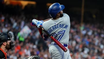 Jul 10, 2024; San Francisco, California, USA; Toronto Blue Jays first base Vladimir Guerrero Jr. (27) hits a double during the sixth inning against the San Francisco Giants at Oracle Park.