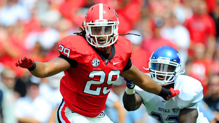September 1, 2012; Athens, GA, USA; Georgia Bulldogs linebacker Jarvis Jones (29) fights off a block against the Buffalo Bulls during the first quarter at Sanford Stadium. Mandatory Credit: Dale Zanine-Imagn Images