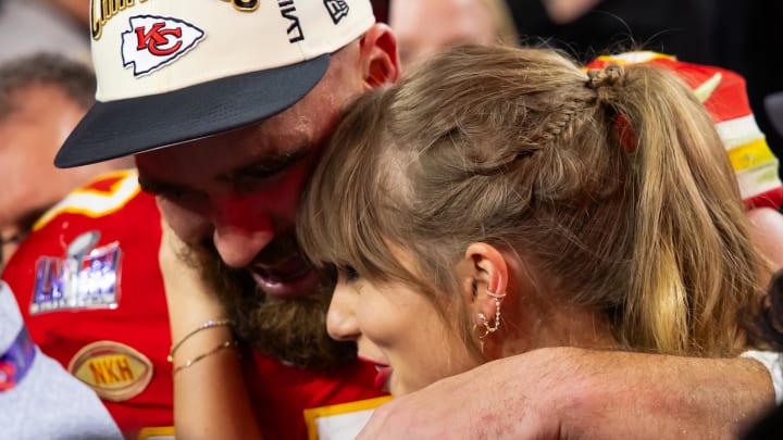 Kansas City Chiefs tight end Travis Kelce (87) celebrates with girlfriend Taylor Swift after defeating the San Francisco 49ers in Super Bowl LVIII at Allegiant Stadium.