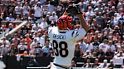 Bengals Mike Gesicki (88) leaps to catch the ball during their games against the Cleveland Browns at Huntington Bank Field on Sunday September 7, 2025. Bengals lead the game at halftime with a score of 14-10.