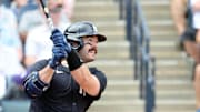 Mar 23, 2025; Tampa, Florida, USA; New York Yankees catcher Austin Wells (28) hits a two-run home run during the fifth inning against the Tampa Bay Rays at George M. Steinbrenner Field. 