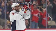 Apr 17, 2025; Pittsburgh, Pennsylvania, USA;  Washington Capitals left wing Alex Ovechkin (8) acknowledges the crowd as a video tribute of his career is played by the Pittsburgh Penguins during the first period at PPG Paints Arena. Mandatory Credit: Charles LeClaire-Imagn Images
