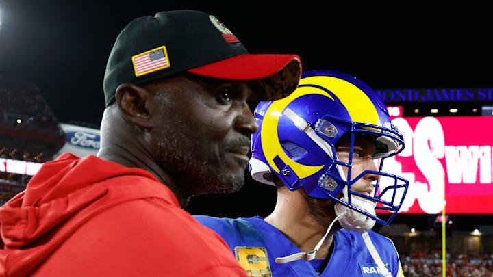 Nov 6, 2022; Tampa, Florida, USA; Tampa Bay Buccaneers head coach Todd Bowles and Los Angeles Rams quarterback Matthew Stafford (9) shake hands after the game at Raymond James Stadium. Mandatory Credit: Douglas DeFelice-Imagn Images