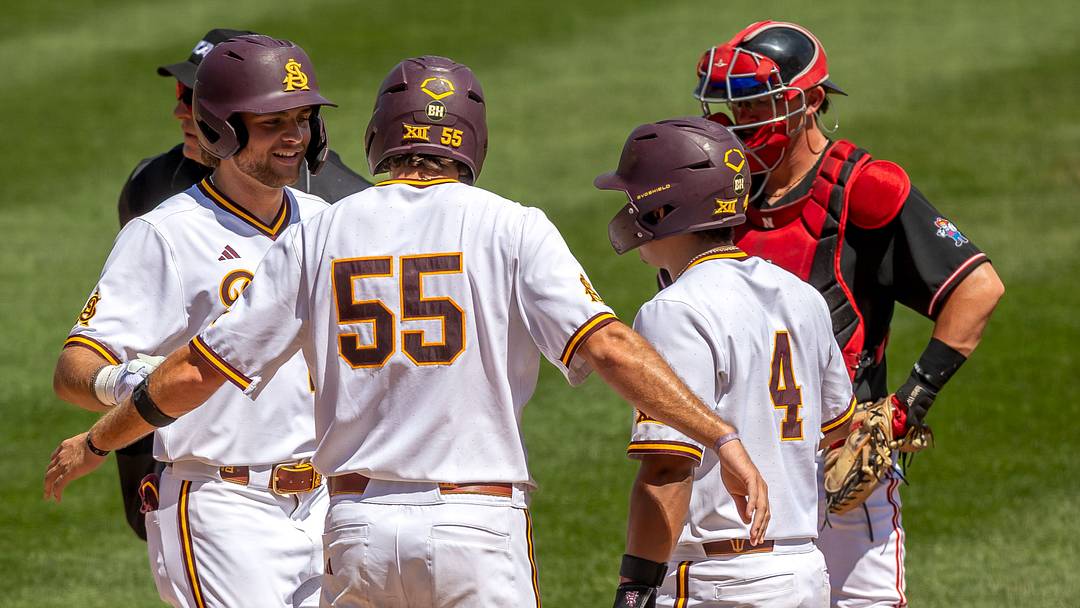 Arizona State players celebrate a home run against Nebraska in the Lincoln Regional.