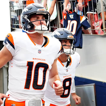 Aug 18, 2024; Denver, Colorado, USA; Denver Broncos quarterback Bo Nix (10) and quarterback Jarrett Stidham (8) before the preseason game against the Green Bay Packers at Empower Field at Mile High.