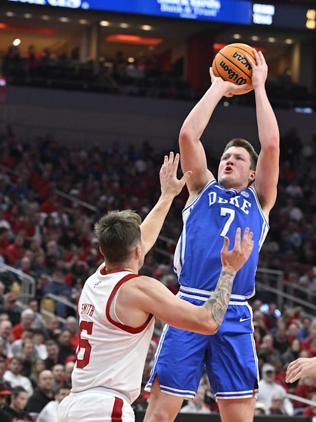 Duke forward Kon Knueppel shoots over a Louisville defender