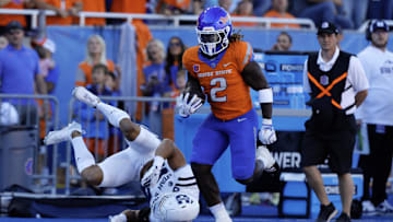 Oct 5, 2024; Boise, Idaho, USA; Boise State Broncos running back Ashton Jeanty (2) runs for a 63 yard touchdown during the first quarter against the Utah State Aggies at Albertsons Stadium. Mandatory Credit: Brian Losness-Imagn Images

