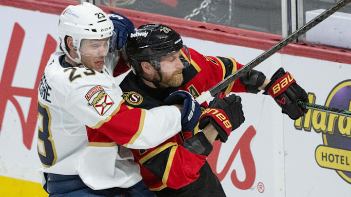 Apr 9, 2026; Ottawa, Ontario, CAN; Florida Panthers center Carter Verhaeghe (23) and  Ottawa Senators right wing Claude Giroux (28) battle in the third period at the Canadian Tire Centre. Mandatory Credit: Marc DesRosiers-IMAGN Images