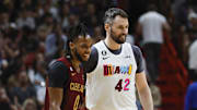 Mar 8, 2023; Miami, Florida, USA; Cleveland Cavaliers guard Darius Garland (10) and Miami Heat forward Kevin Love (42) on the court during the second quarter at Miami-Dade Arena. Mandatory Credit: Sam Navarro-Imagn Images