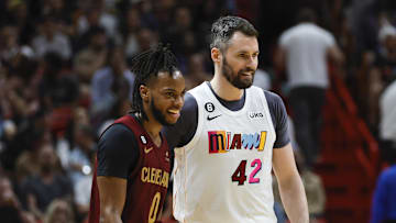 Mar 8, 2023; Miami, Florida, USA; Cleveland Cavaliers guard Darius Garland (10) and Miami Heat forward Kevin Love (42) on the court during the second quarter at Miami-Dade Arena. Mandatory Credit: Sam Navarro-Imagn Images