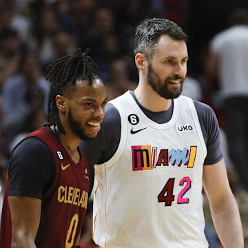 Mar 8, 2023; Miami, Florida, USA; Cleveland Cavaliers guard Darius Garland (10) and Miami Heat forward Kevin Love (42) on the court during the second quarter at Miami-Dade Arena. Mandatory Credit: Sam Navarro-Imagn Images