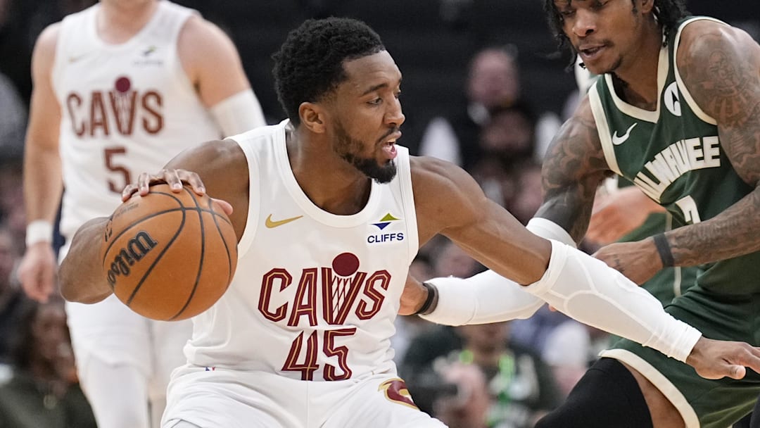 Mar 17, 2026; Milwaukee, Wisconsin, USA; Cleveland Cavaliers guard Donovan Mitchell (45) drives against Milwaukee Bucks guard/forward Kevin Porter Jr. (7) in the second half at Fiserv Forum. Mandatory Credit: Michael McLoone-Imagn Images Mar 17, 2026; Milwaukee, Wisconsin, USA; Cleveland Cavaliers guard Donovan Mitchell (45) drives against Milwaukee Bucks guard/forward Kevin Porter Jr. (7) in the second half at Fiserv Forum. Mandatory Credit: Michael McLoone-Imagn Images