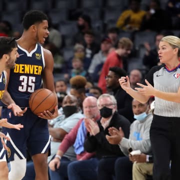 Nov 1, 2021; Memphis, Tennessee, USA; Denver Nuggets forward-center JaMychal Green (0), guard Facundo Campazzo (7) and guard-forward P.J. Dozier (35) react to a foul call to the referee during the second half against the Memphis Grizzlies at FedExForum. Mandatory Credit: Petre Thomas-USA TODAY Sports