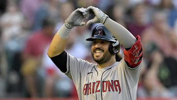 Jul 12, 2025; Anaheim, California, USA;  Arizona Diamondbacks third baseman Eugenio Suarez (28) celebrates after hitting his second solo home run of the game during the fourth inning against the Los Angeles Angels at Angel Stadium. Mandatory Credit: Jayne Kamin-Oncea-Imagn Images