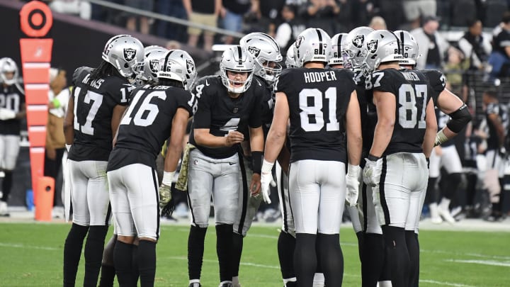 Nov 12, 2023; Paradise, Nevada, USA; Las Vegas Raiders quarterback Aidan O'Connell (4) in the huddle against the New York Jets in the fourth quarter at Allegiant Stadium. Mandatory Credit: Candice Ward-USA TODAY Sports