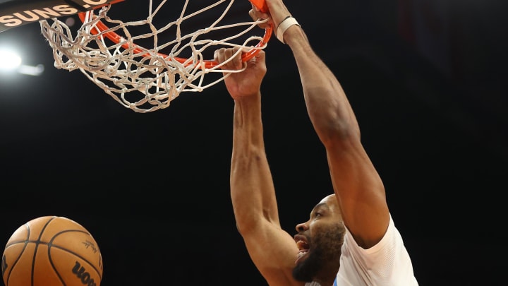 Dec 20, 2022; Phoenix, Arizona, USA; Washington Wizards forward Taj Gibson (67) slam dunks the ball against the Phoenix Suns in the first half at Footprint Center. Mandatory Credit: Mark J. Rebilas-USA TODAY Sports