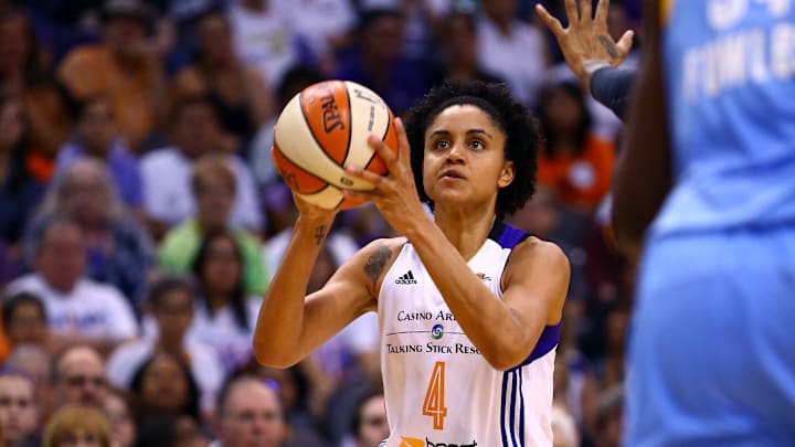 Sep 7, 2014; Phoenix, AZ, USA; Phoenix Mercury forward Candice Dupree (4) against the Chicago Sky during game one of the WNBA Finals at US Airways Center. The Mercury defeated the Sky 83-62. Mandatory Credit: Mark J. Rebilas-Imagn Images
