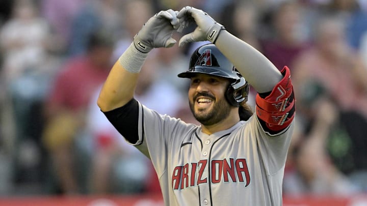 Jul 12, 2025; Anaheim, California, USA;  Arizona Diamondbacks third baseman Eugenio Suarez (28) celebrates after hitting his second solo home run of the game during the fourth inning against the Los Angeles Angels at Angel Stadium. Mandatory Credit: Jayne Kamin-Oncea-Imagn Images