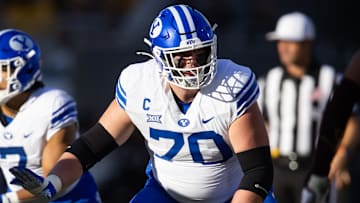 Nov 23, 2024; Tempe, Arizona, USA; Brigham Young Cougars offensive lineman Connor Pay (70) against the Arizona State Sun Devils at Mountain America Stadium. Mandatory Credit: Mark J. Rebilas-Imagn Images