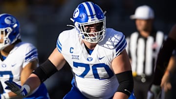 Nov 23, 2024; Tempe, Arizona, USA; Brigham Young Cougars offensive lineman Connor Pay (70) against the Arizona State Sun Devils at Mountain America Stadium. Mandatory Credit: Mark J. Rebilas-Imagn Images
