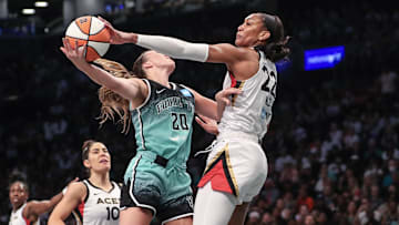 Former South Carolina basketball star A'ja Wilson blocking fellow All-WNBA player Sabrina Ionescu
