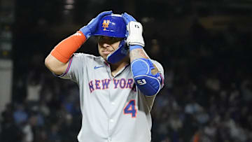 Sep 23, 2025; Chicago, Illinois, USA; New York Mets catcher Francisco Alvarez (4) gestures to the dugout after hitting a two-run home run against the Chicago Cubs during the eighth inning at Wrigley Field. Mandatory Credit: David Banks-Imagn Images