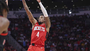Feb 9, 2025; Houston, Texas, USA; Houston Rockets guard Jalen Green (4) shoots the ball during the fourth quarter against the Toronto Raptors at Toyota Center. Mandatory Credit: Troy Taormina-Imagn Images