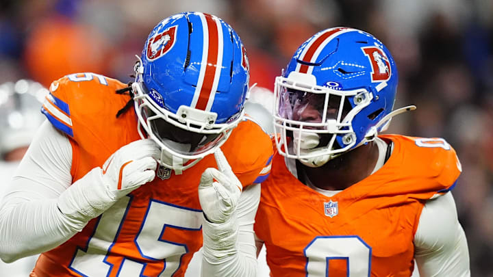 Denver Broncos linebacker Nik Bonitto and linebacker Jonathon Cooper 