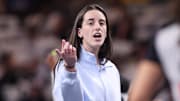 Sep 14, 2025; College Park, Georgia, USA; Indiana Fever guard Caitlin Clark (22) on the sideline against the Atlanta Dream in the first quarter during game one of round one for the 2025 WNBA Playoffs at Gateway Center Arena at College Park. Mandatory Credit: Brett Davis-Imagn Images
