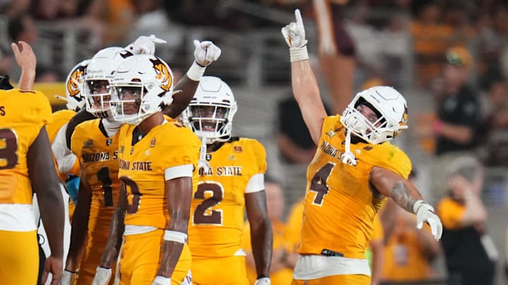 Arizona State running back Cam Skattebo (4) celebrates with his teammates during the final minutes of their 30-23 win over the Mississippi State Bulldogs at Mountain America Stadium on Sept. 7, 2024, in Tempe.