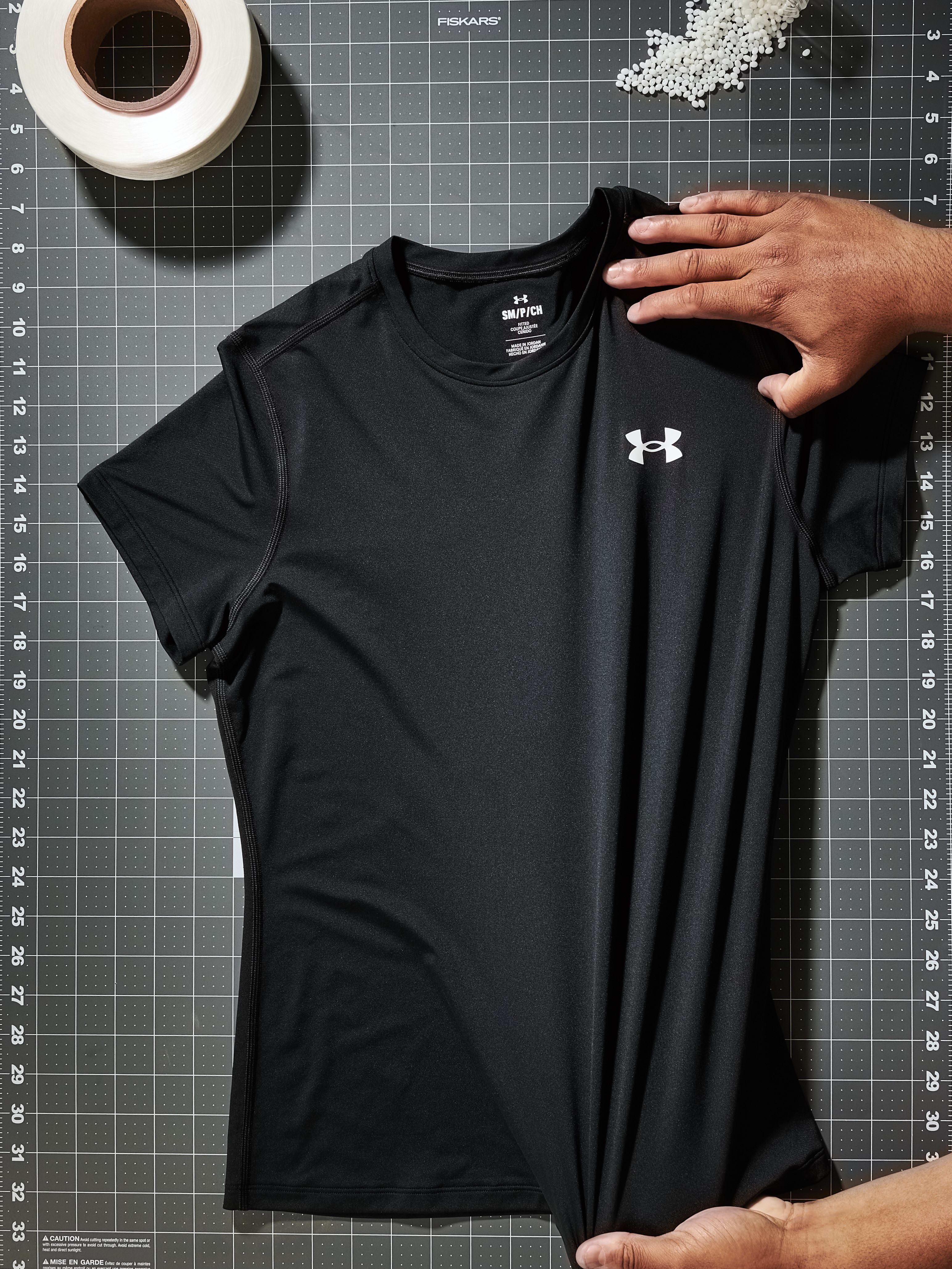 A black Under Armour shirt.