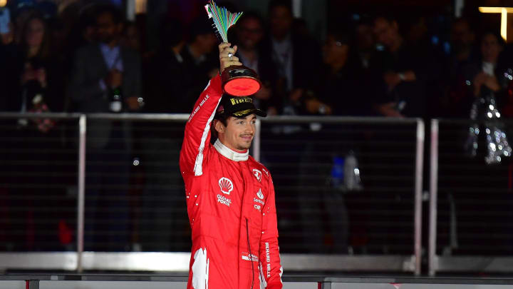 Nov 18, 2023; Las Vegas, Nevada, USA; Scuderia Ferrari driver Charles LeClerc of Monaco (16) celebrates after placing second in the Las Vegas Grand Prix at Las Vegas Strip Circuit. Mandatory Credit: Gary A. Vasquez-USA TODAY Sports