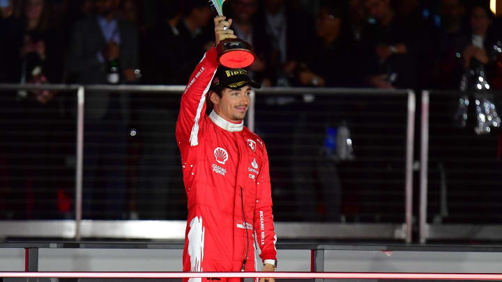 Nov 18, 2023; Las Vegas, Nevada, USA; Scuderia Ferrari driver Charles LeClerc of Monaco (16) celebrates after placing second in the Las Vegas Grand Prix at Las Vegas Strip Circuit. Mandatory Credit: Gary A. Vasquez-USA TODAY Sports