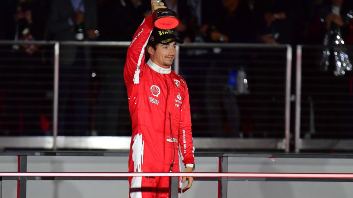 Nov 18, 2023; Las Vegas, Nevada, USA; Scuderia Ferrari driver Charles LeClerc of Monaco (16) celebrates after placing second in the Las Vegas Grand Prix at Las Vegas Strip Circuit. Mandatory Credit: Gary A. Vasquez-USA TODAY Sports