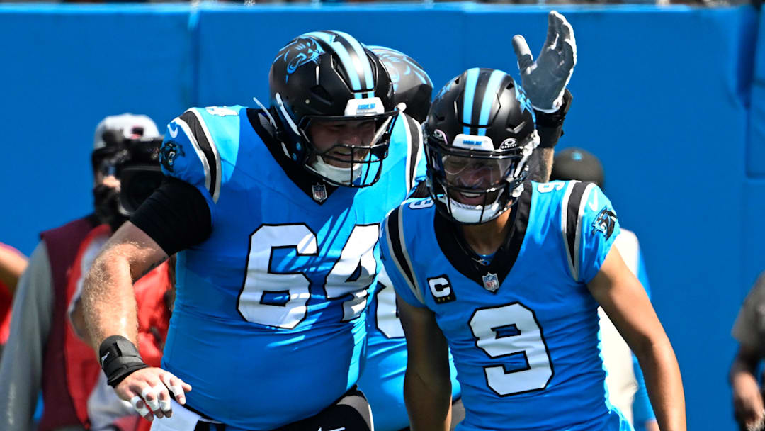 Sep 21, 2025; Charlotte, North Carolina, USA; Carolina Panthers quarterback Bryce Young (9) celebrates with center Cade Mays (64) after scoring a touchdown in the first quarter at Bank of America Stadium. Mandatory Credit: Bob Donnan-Imagn Images Sep 21, 2025; Charlotte, North Carolina, USA; Carolina Panthers quarterback Bryce Young (9) celebrates with center Cade Mays (64) after scoring a touchdown in the first quarter at Bank of America Stadium. Mandatory Credit: Bob Donnan-Imagn Images