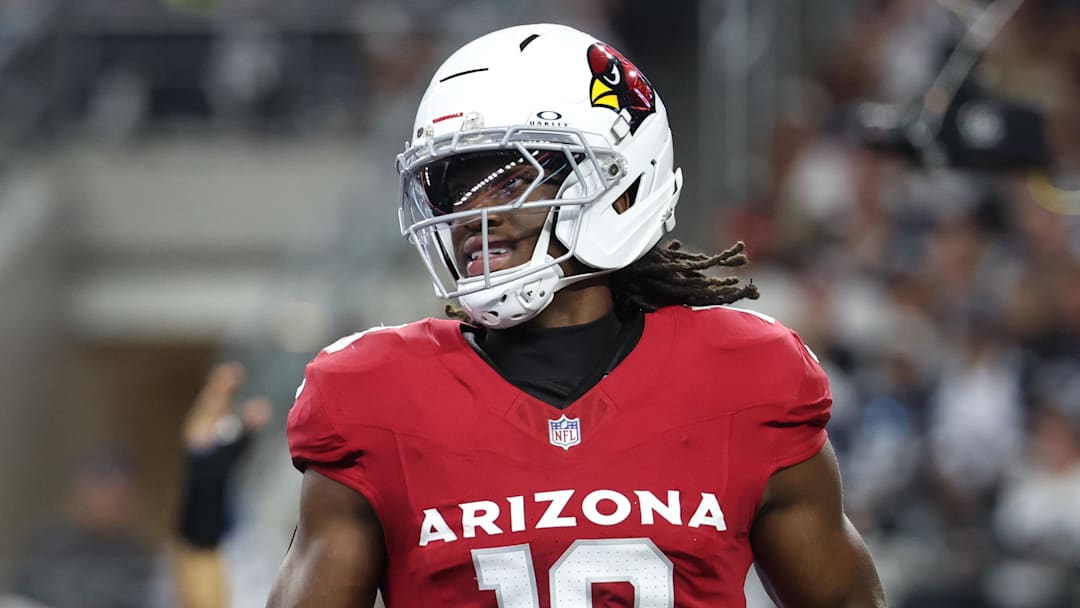Nov 3, 2025; Arlington, Texas, USA; Arizona Cardinals wide receiver Marvin Harrison Jr. (18) scores a touchdown against the Dallas Cowboys in the first half at AT&T Stadium. Mandatory Credit: Kevin Jairaj-Imagn Images