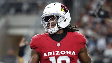 Nov 3, 2025; Arlington, Texas, USA; Arizona Cardinals wide receiver Marvin Harrison Jr. (18) scores a touchdown against the Dallas Cowboys in the first half at AT&T Stadium. Mandatory Credit: Kevin Jairaj-Imagn Images
