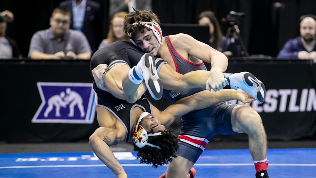 Mar 22, 2024; Kansas City, MO, USA; Jesse Mendez of Ohio State wrestles Anthony Echemendia of Iowa State during the semifinal of the Men’s Division I NCAA Wrestling Championships at T-Mobile Center. Mandatory Credit: Nick Tre. Smith-Imagn Images
