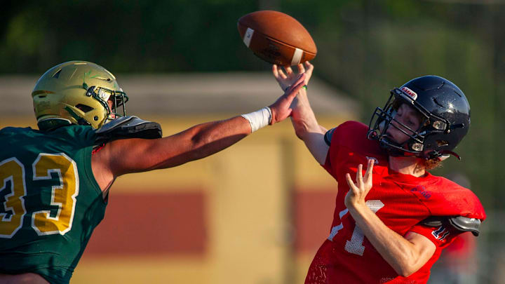 A West player throws the ball during a scrimmage between West and Catholic High School at Blaine Stadium on Friday, August 9, 2024,