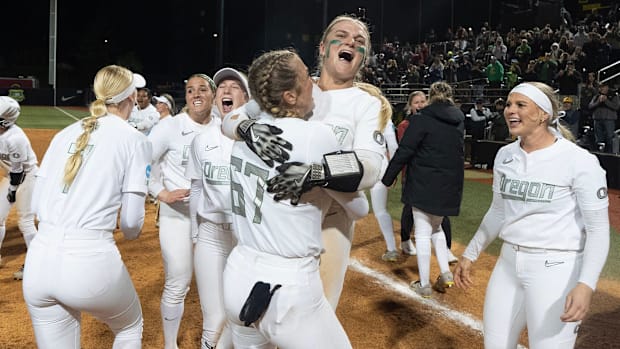 The Oregon Ducks celebrate their victory over Stanford to win the Eugene NCAA softball regional May 18, 2025.