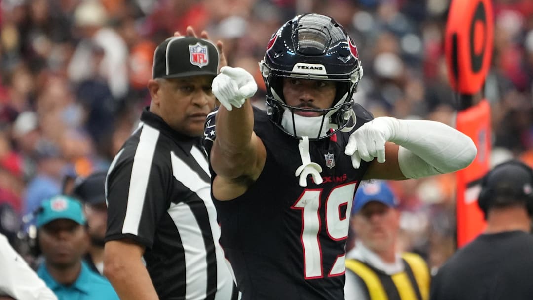 Nov 2, 2025; Houston, Texas, USA; Houston Texans wide receiver Xavier Hutchinson (19) reacts after a first down during the second half against the Denver Broncos at NRG Stadium. Mandatory Credit: Sean Thomas-Imagn Images