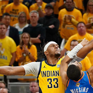 Jun 13, 2025; Indianapolis, Indiana, USA; Indiana Pacers center Myles Turner (33) blocks the shot of Oklahoma City Thunder guard Aaron Wiggins (21) during the first half during game four of the 2025 NBA Finals at Gainbridge Fieldhouse. Mandatory Credit: Kyle Terada-Imagn Images