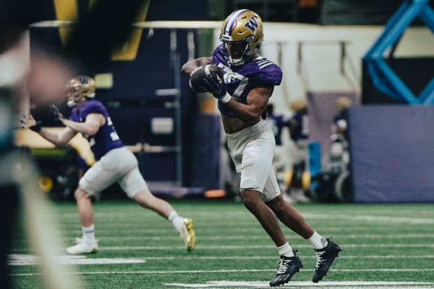 Vincent Holmes goes through an interception drill in spring.