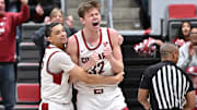 Feb 8, 2025; Pullman, Washington, USA; Washington State Cougars forward Dane Erikstrup (32) and guard Isaiah Watts (12) celebrate after a play against the Pepperdine Waves in the second half at Friel Court at Beasley Coliseum. Washington State Cougars won 87-86. Mandatory Credit: James Snook-Imagn Images