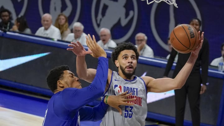 May 15, 2024; Chicago, IL, USA; Ulrich Chomche (62) and Ajay Mitchell (53) participate during the 2024 NBA Draft Combine at Wintrust Arena. Mandatory Credit: David Banks-USA TODAY Sports