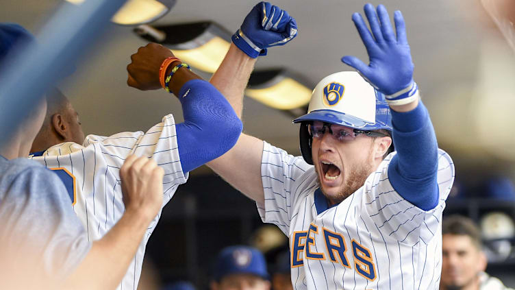 Jul 16, 2017; Milwaukee, WI, USA;  Milwaukee Brewers pinch hitter Brett Phillips (33) celebrates in the dugout after hitting a 2-run home run in the fifth inning against the Philadelphia Phillies at Miller Park. Mandatory Credit: Benny Sieu-USA TODAY Sports