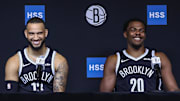 Sep 23, 2025; Brooklyn, NY, USA;  Brooklyn Nets guard Tyrese Martin (13) and center Day'Ron Sharpe (20) speak at Media Day. Mandatory Credit: Wendell Cruz-Imagn Images