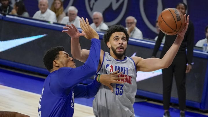 May 15, 2024; Chicago, IL, USA; Ulrich Chomche (62) and Ajay Mitchell (53) participate during the 2024 NBA Draft Combine at Wintrust Arena. Mandatory Credit: David Banks-USA TODAY Sports