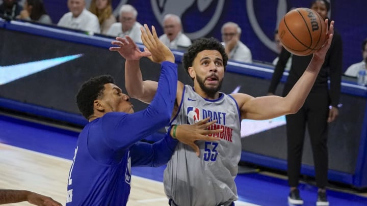 May 15, 2024; Chicago, IL, USA; Ulrich Chomche (62) and Ajay Mitchell (53) participate during the 2024 NBA Draft Combine at Wintrust Arena. Mandatory Credit: David Banks-USA TODAY Sports